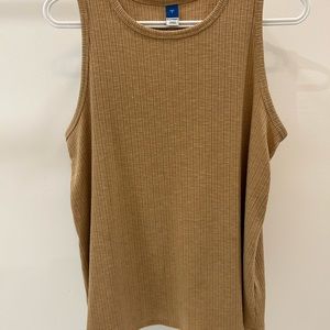 Old Navy tank. Loose & stretchy. Super comfortable. Looks cute slightly tucked